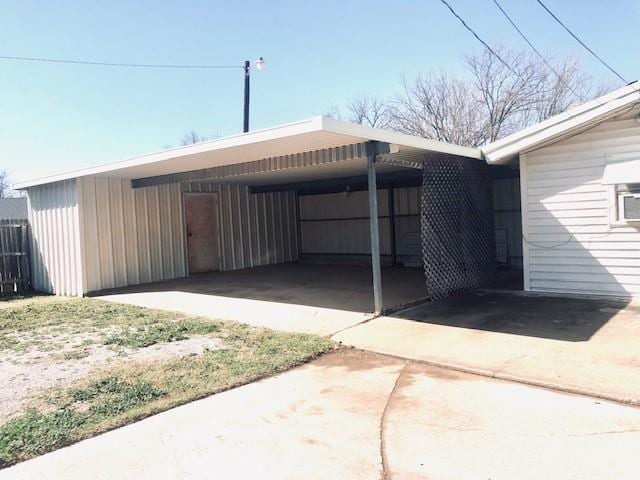 exterior space featuring a carport