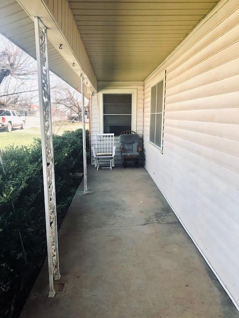 view of patio featuring a porch