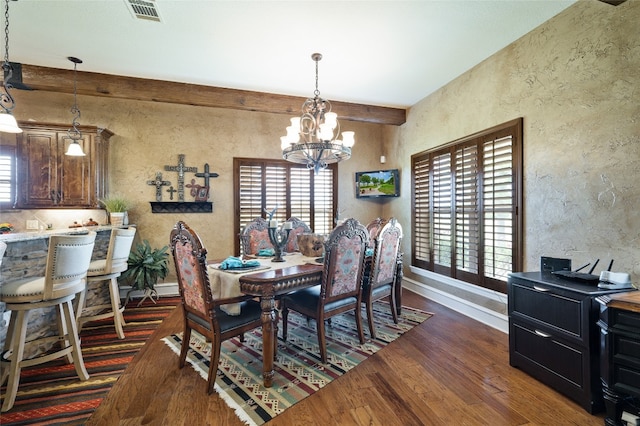 dining space with an inviting chandelier, plenty of natural light, beam ceiling, and dark hardwood / wood-style floors