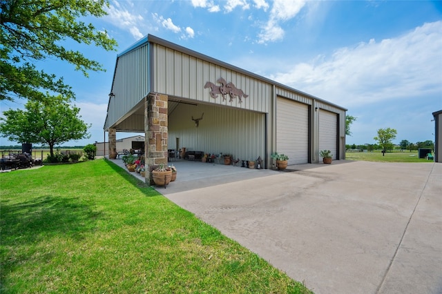 garage featuring a yard