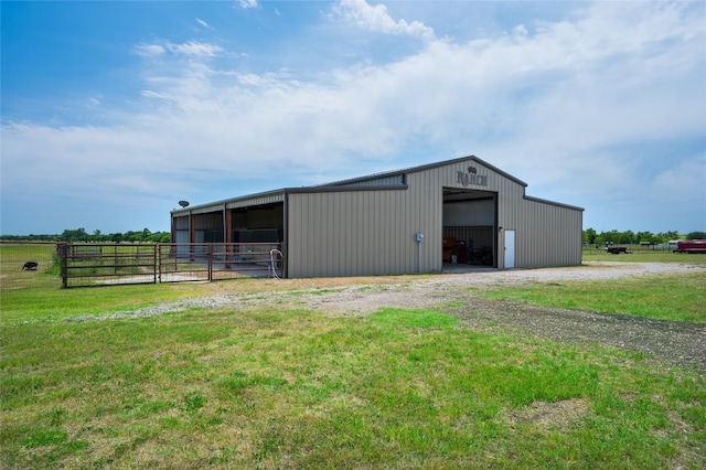 view of outdoor structure featuring a yard