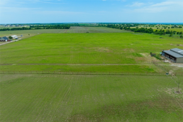 birds eye view of property featuring a rural view