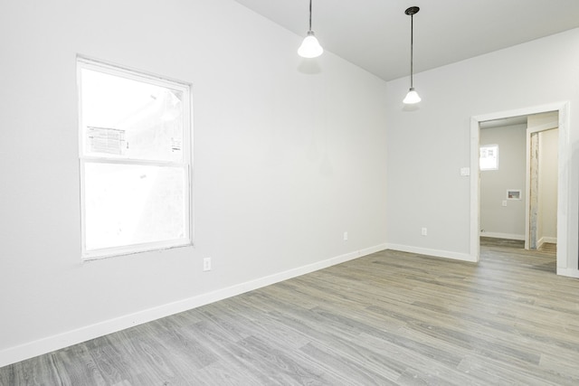 unfurnished room featuring light wood-type flooring