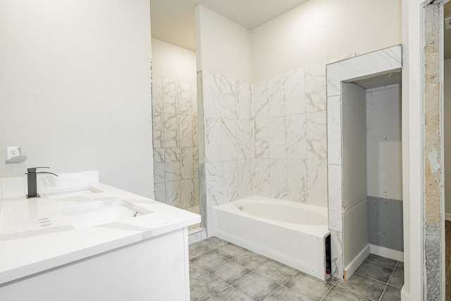 bathroom featuring dual bowl vanity and tile floors