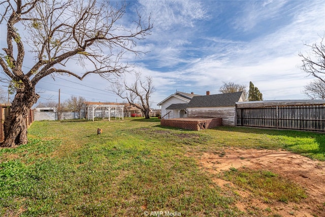 1832 Commercial Ave, Anson, TX 79501 - view of yard with a pergola and a deck