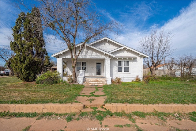1832 Commercial Ave, Anson, TX 79501 - view of front of house with a front lawn and a porch