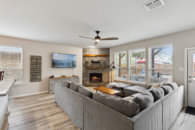 kitchen featuring stainless steel appliances, white cabinetry, and a center island