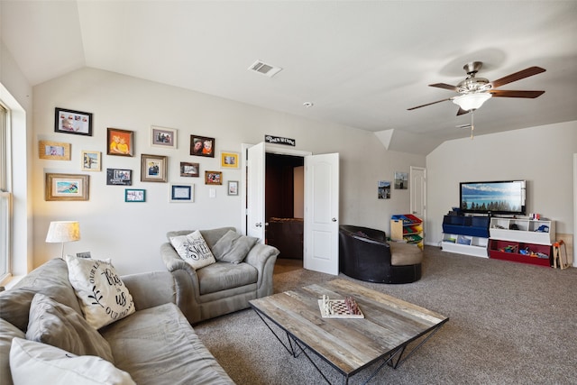 dining space with carpet, a textured ceiling, and ceiling fan