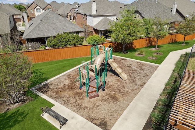 view of jungle gym with a lawn