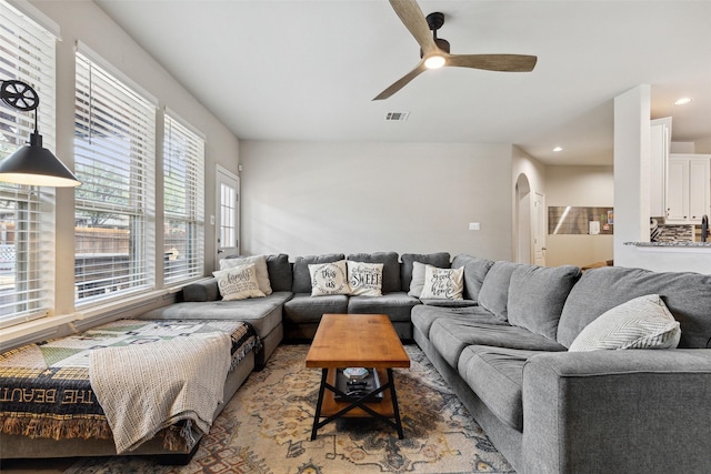 living room with ceiling fan