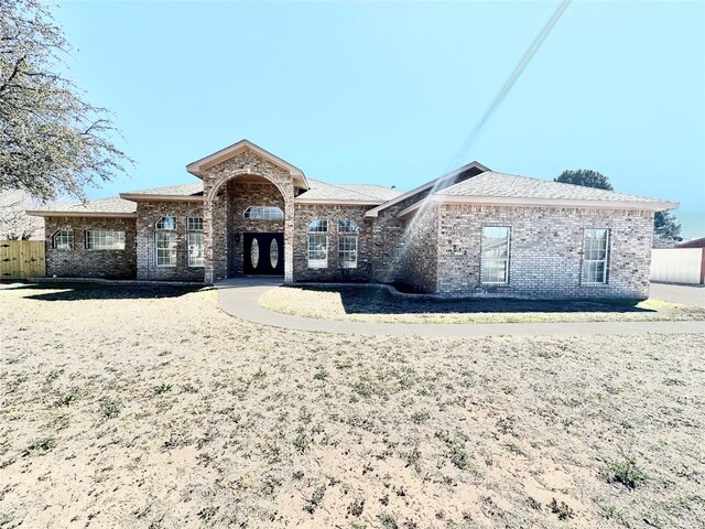 view of front facade featuring french doors