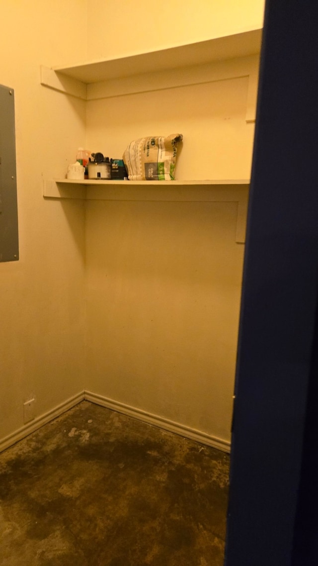 spacious closet featuring electric panel