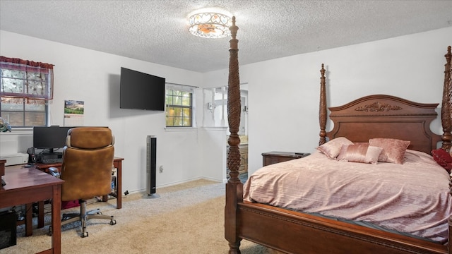 carpeted bedroom featuring a textured ceiling