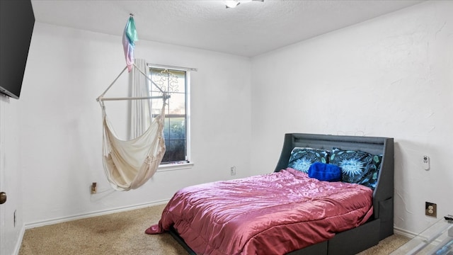 bedroom with light carpet