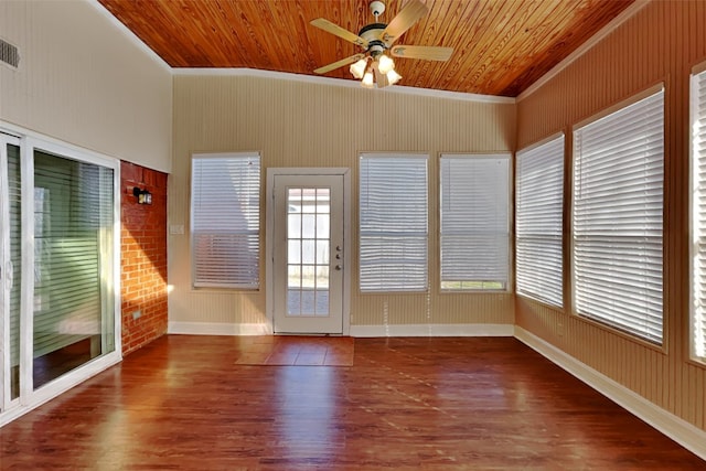 unfurnished sunroom with ceiling fan, wood ceiling, and vaulted ceiling