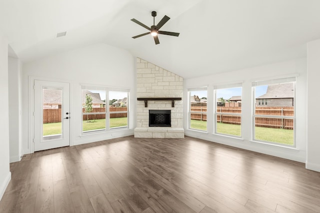 unfurnished living room featuring hardwood / wood-style flooring, a fireplace, high vaulted ceiling, and ceiling fan