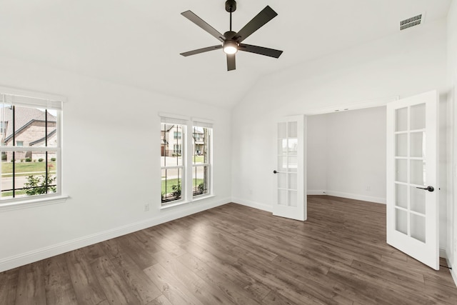 unfurnished room featuring a wealth of natural light, ceiling fan, and french doors