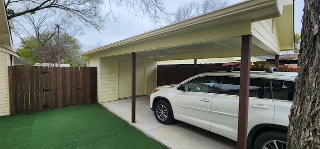 view of vehicle parking with a carport