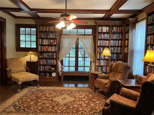 sitting room featuring coffered ceiling, beamed ceiling, and hardwood / wood-style floors