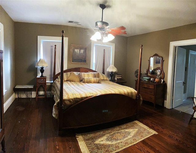 bedroom with ceiling fan and hardwood / wood-style floors