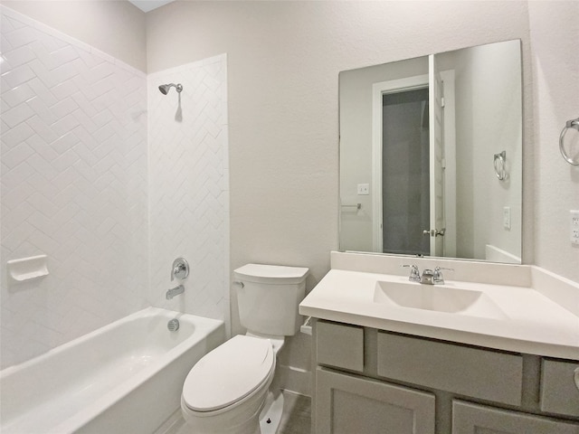 full bathroom with oversized vanity, toilet, and tiled shower / bath