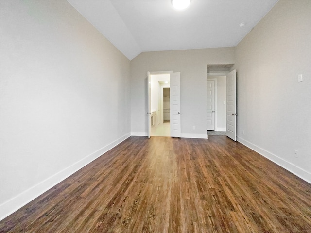 spare room featuring dark hardwood / wood-style floors