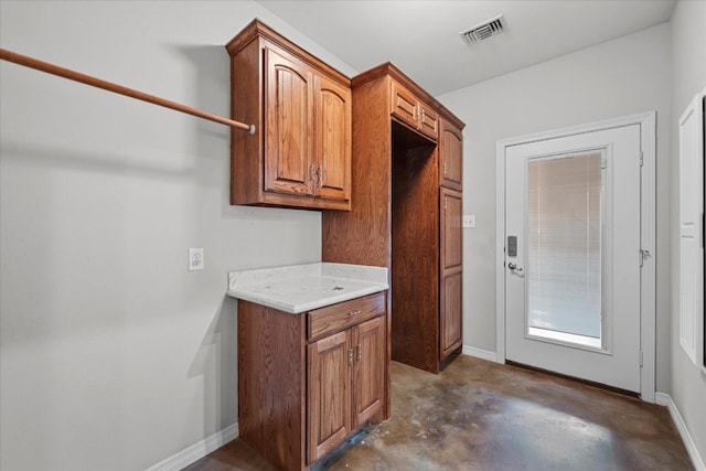 exterior space featuring ceiling fan