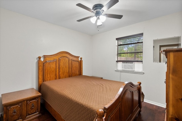 bedroom with cooling unit and ceiling fan