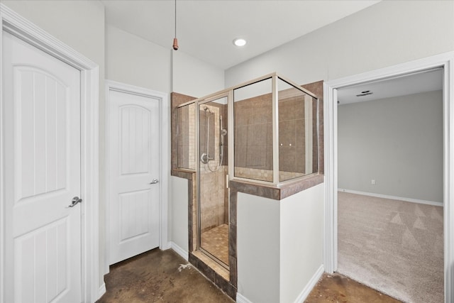 bathroom with ceiling fan, vanity, and concrete flooring