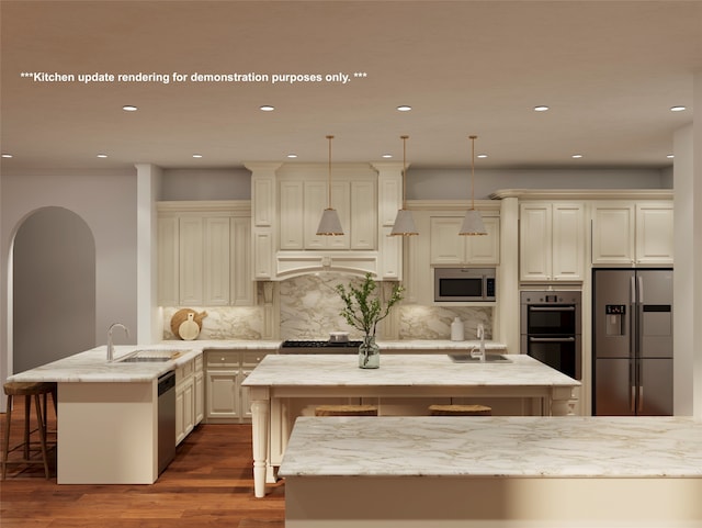 kitchen with kitchen peninsula, tasteful backsplash, stainless steel appliances, sink, and hanging light fixtures