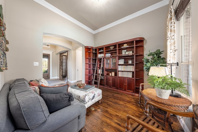 sitting room featuring dark hardwood / wood-style flooring and crown molding