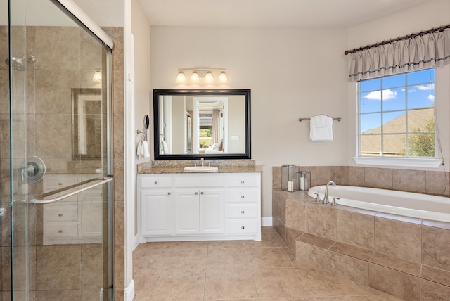 bathroom featuring tile patterned flooring, vanity, and independent shower and bath