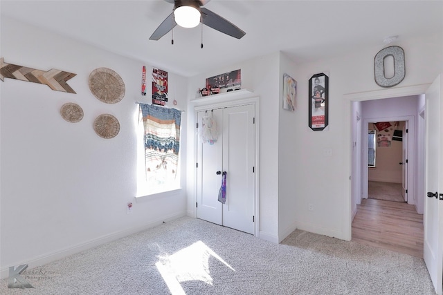 bedroom with ceiling fan and light wood-type flooring