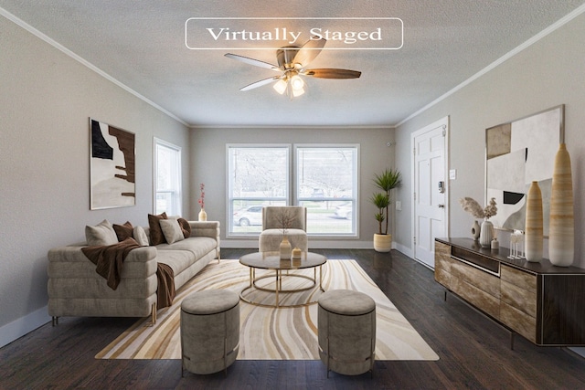 living room featuring ornamental molding, a textured ceiling, ceiling fan, and dark wood-type flooring