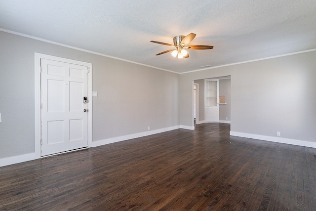 spare room with a textured ceiling, ceiling fan, and dark wood-type flooring