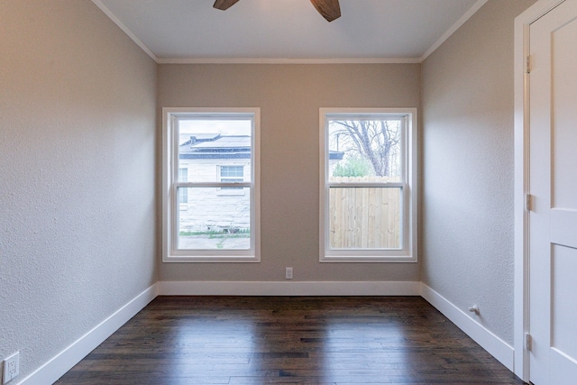 unfurnished room with ceiling fan, dark wood-type flooring, and a wealth of natural light