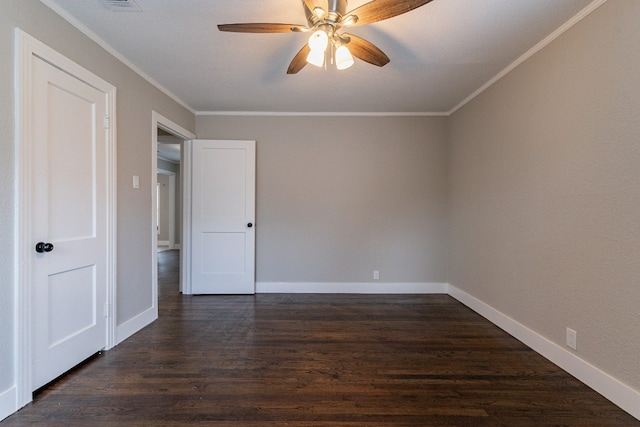 unfurnished room with dark hardwood / wood-style flooring, ceiling fan, and ornamental molding