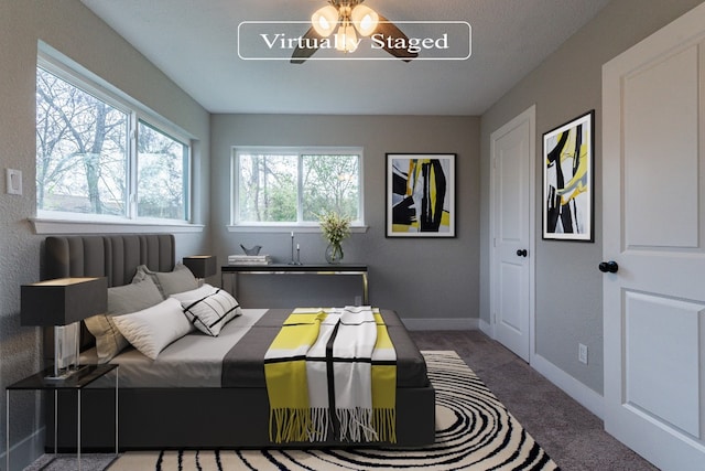 bedroom featuring dark colored carpet