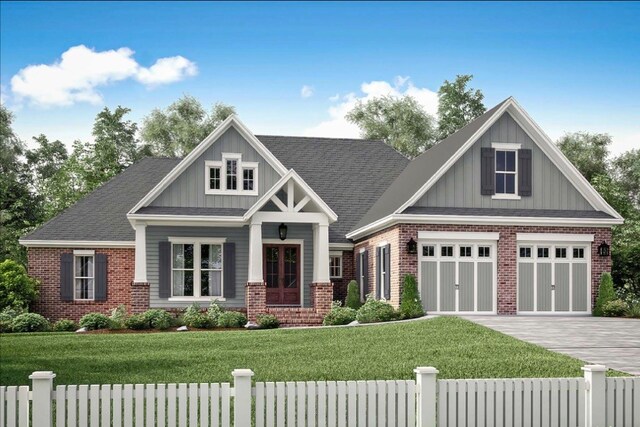 craftsman-style house with a front yard and a garage