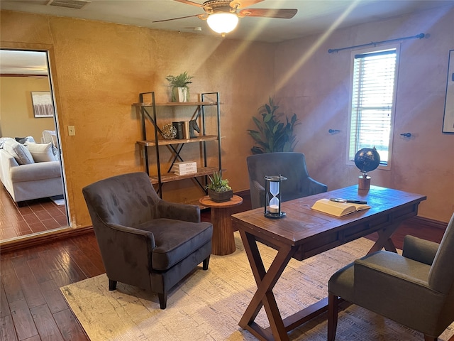 office space featuring hardwood / wood-style floors and ceiling fan