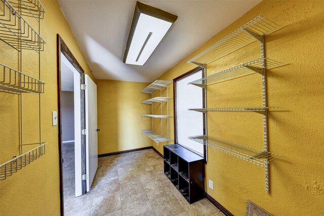 bedroom with dark hardwood / wood-style flooring and a textured ceiling