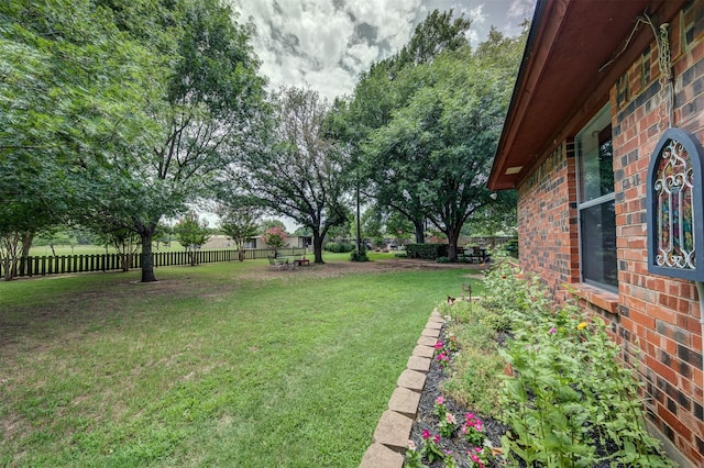 view of yard featuring fence