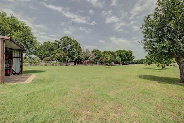 view of yard with fence