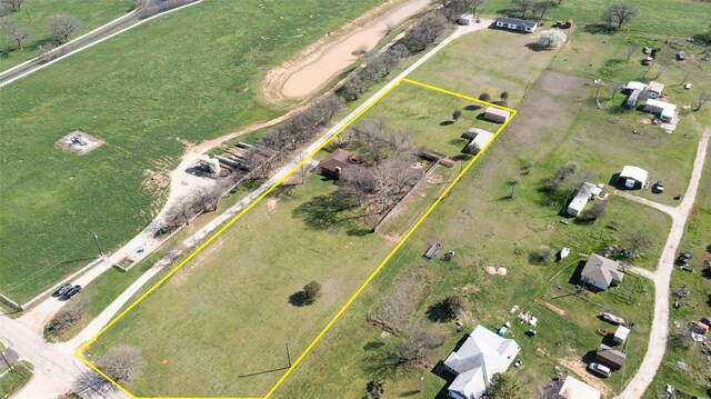 bird's eye view featuring a rural view and a water view