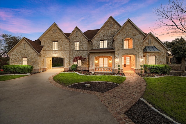 3000 Bluffs Ln, Parker, TX 75002 - french country inspired facade featuring a yard, french doors, and curved driveway