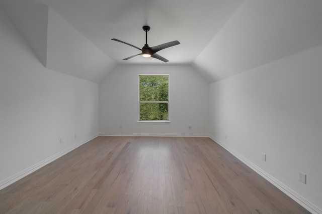 bonus room featuring light hardwood / wood-style floors, ceiling fan, and vaulted ceiling