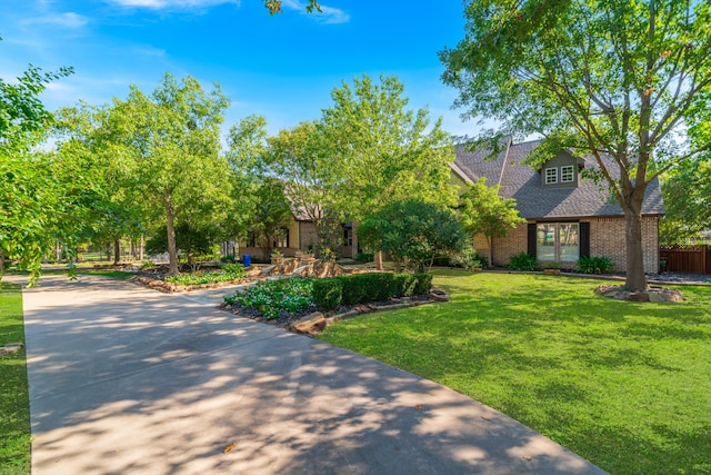 view of front of property with a front lawn