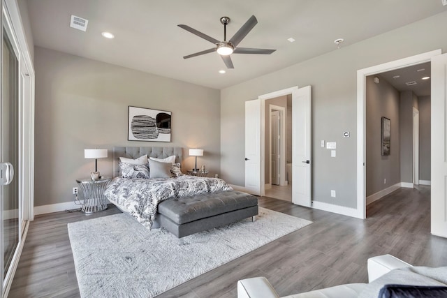 bedroom featuring ceiling fan and dark wood-type flooring