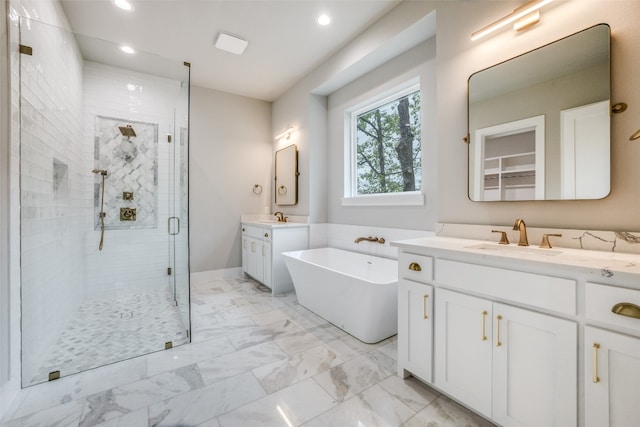 bathroom with tile flooring, vanity, and separate shower and tub