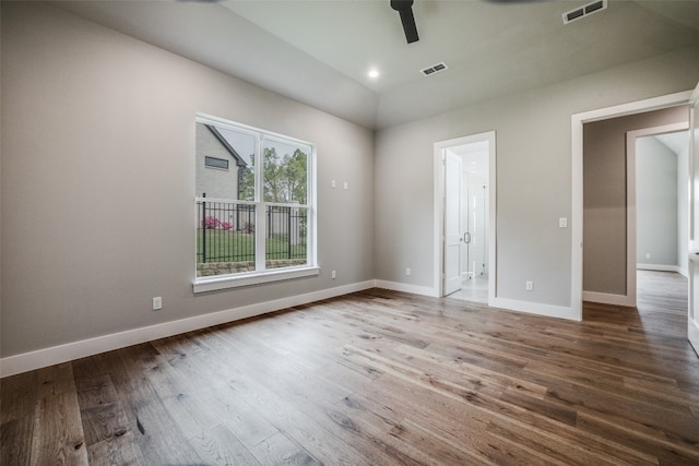 unfurnished room with hardwood / wood-style floors